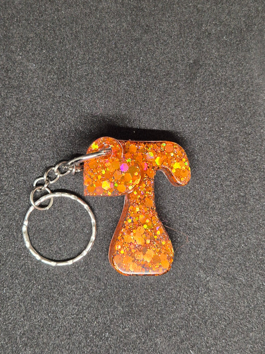 Llavero letra T naranja con brillo holográfico
